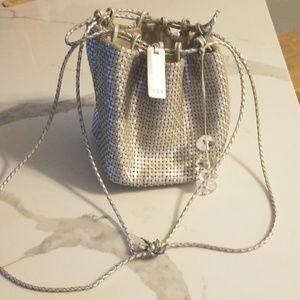 Silver Drawstring CEM woven leather purse.